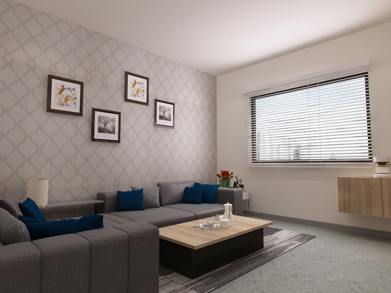 Hospital room with patient bed, visitor seating and privacy curtain